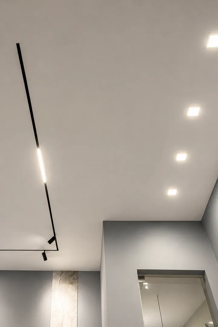 Gapless Stretch Ceilings shadow stretch ceiling room black track lighting